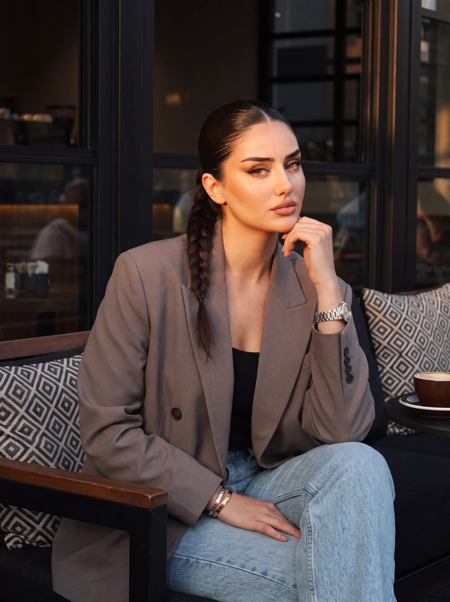 Golden-Hour Café Portrait with Dark Feminine Elegance