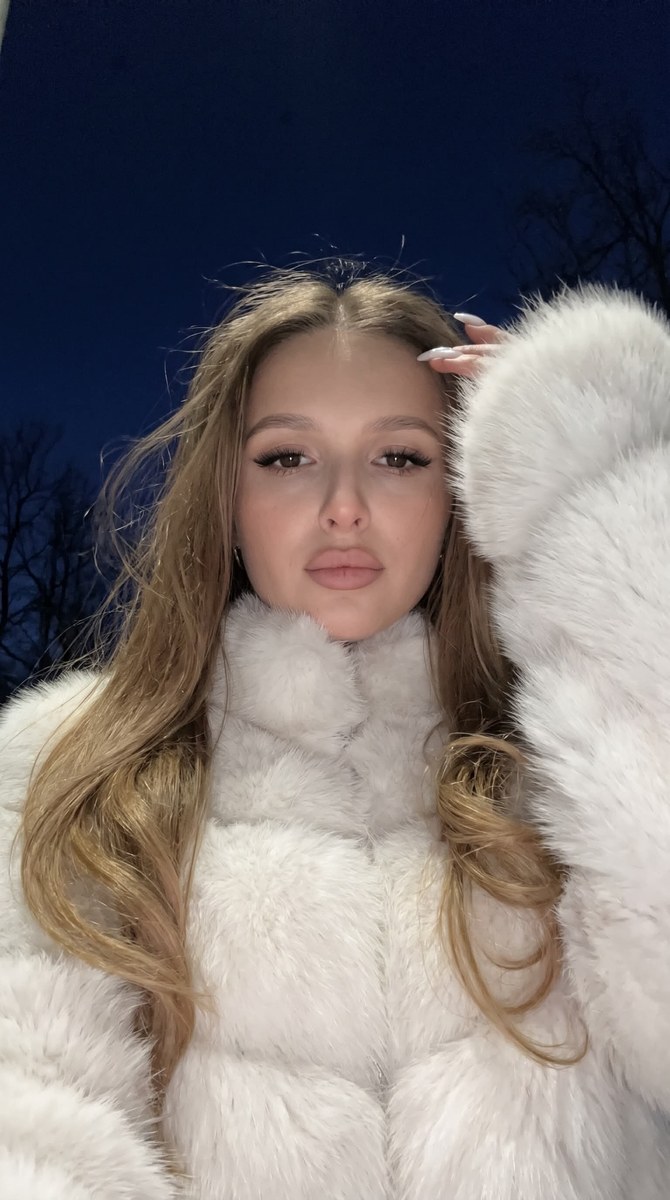 Cold-Blue Nighttime Fur-Coat Selfie