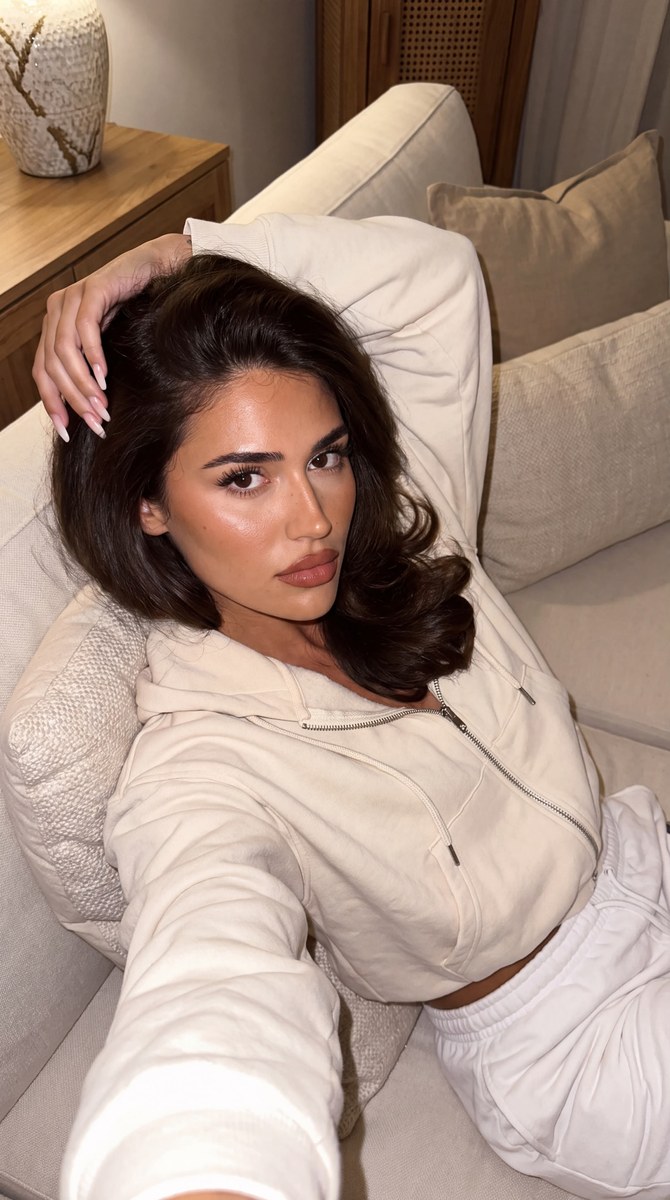 Y2K Flash Selfie on a Cozy Sofa