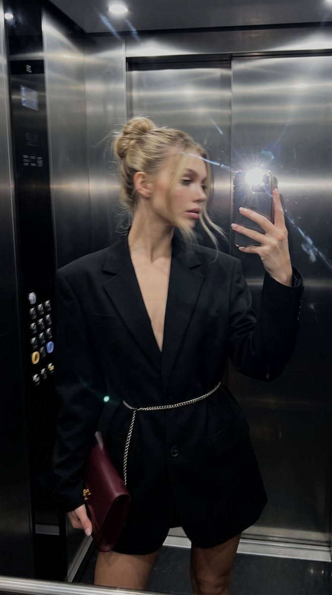Blurred Elevator Mirror Selfie