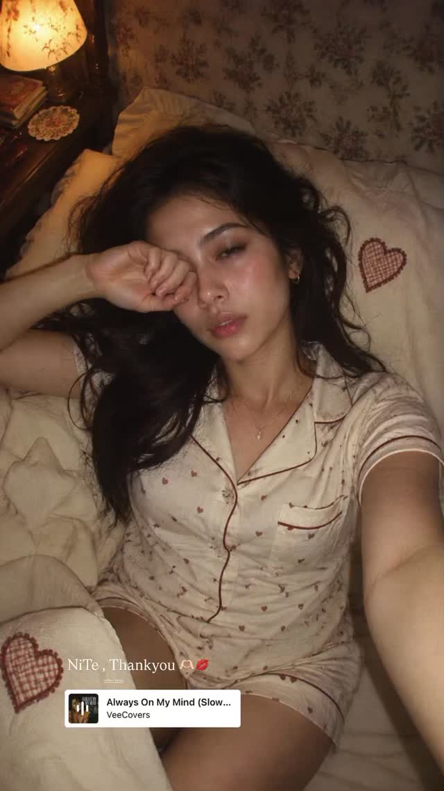 Sleepy Woman in a Dim Bedroom