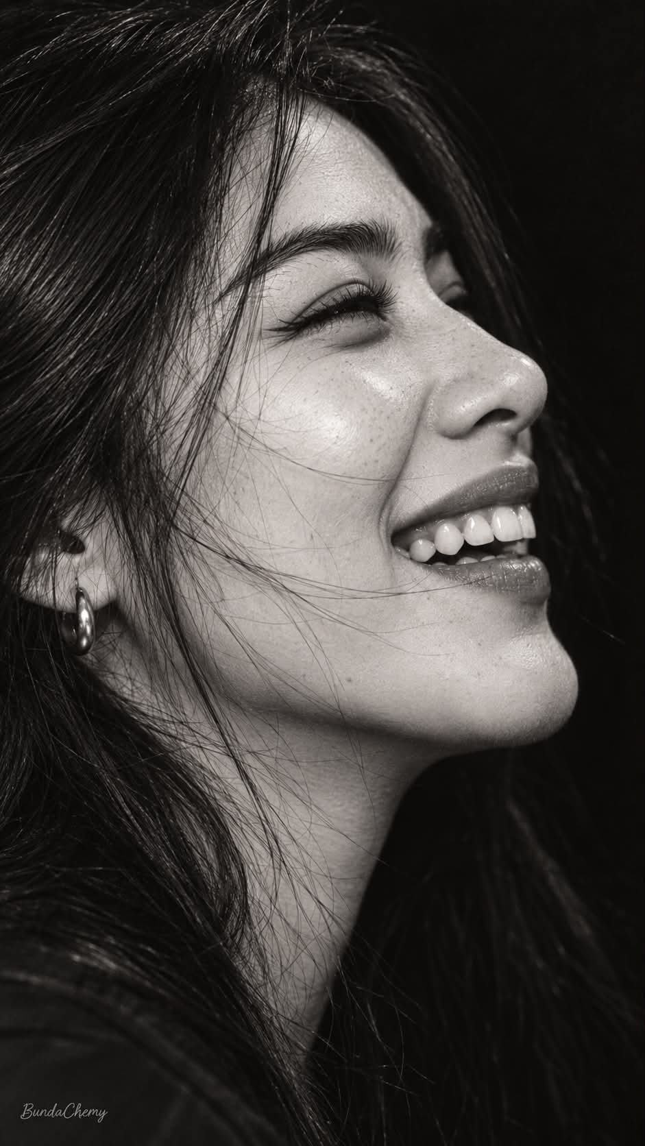 Candid Side-Profile Laughing Portrait