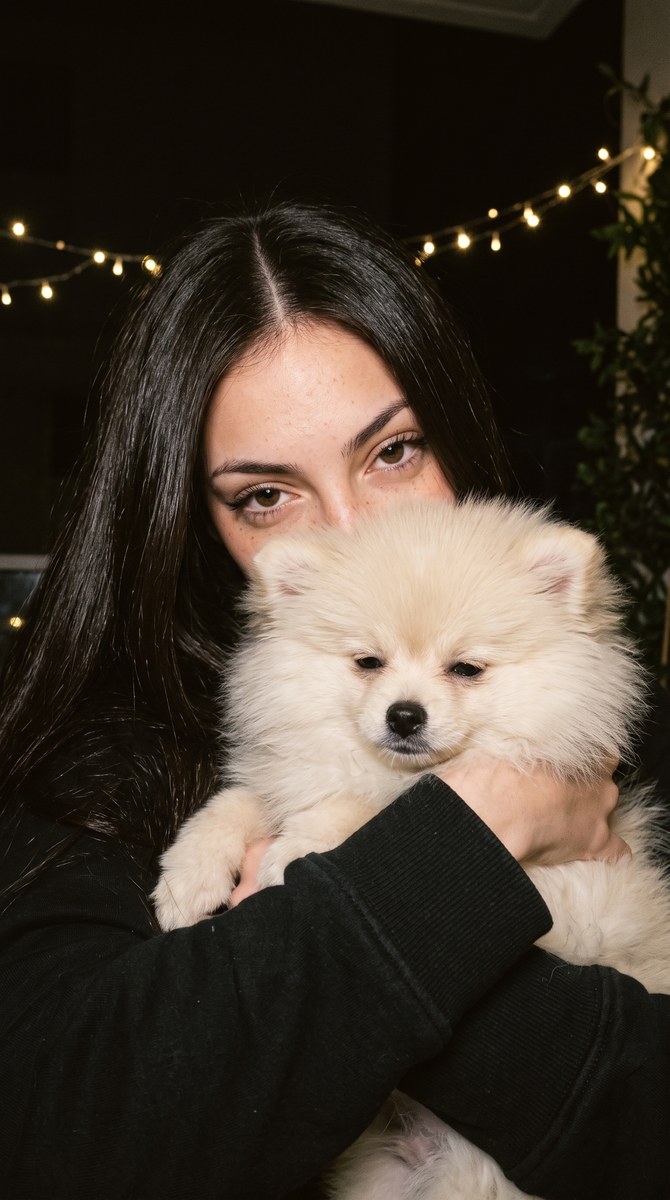 Refrigerator-Lit Selfie with a Pomeranian