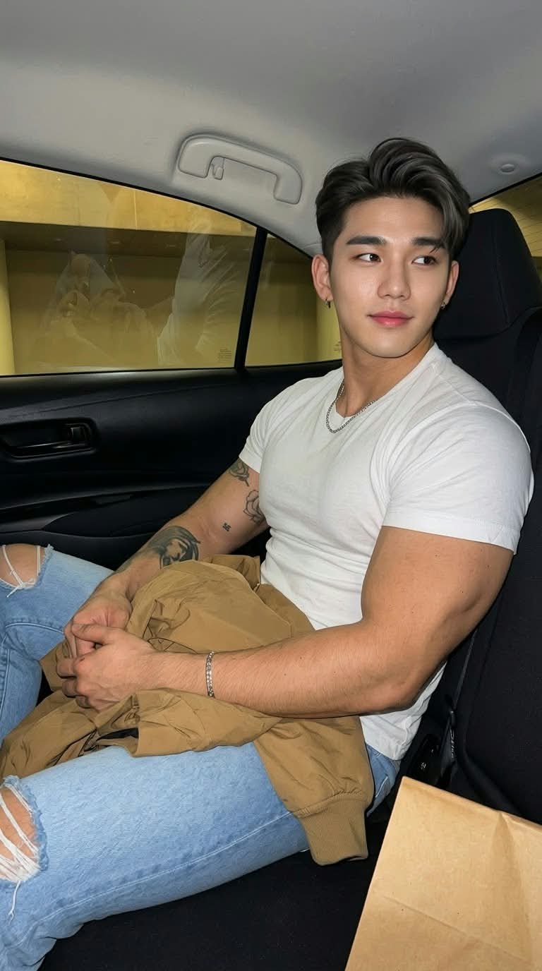 Photorealistic Korean Man Seated in a Car output 1