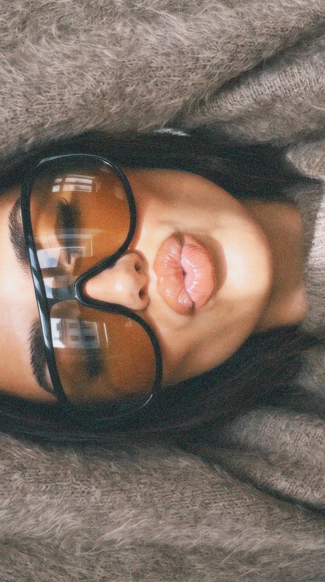 Photorealistic Close-Up Selfie in an Oversized Taupe Sweater output 2